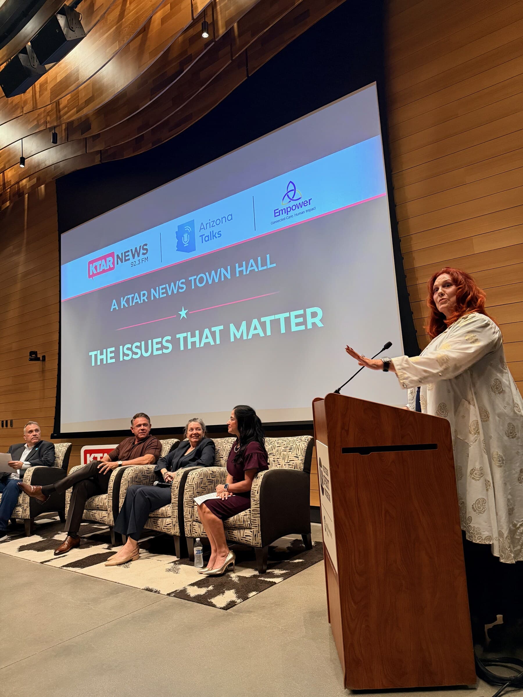 A speaker addressing the audience at The Issues That Matter town hall