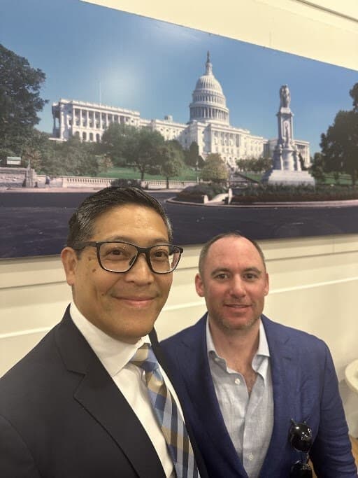 Dr. Loeb with Adrian Atizado during a TriWest Healthcare Alliance meeting